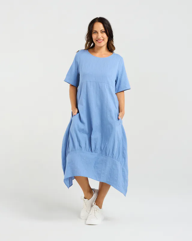 Model wearing Blue Selena Dress By Seduce Available at Beetees Nelson