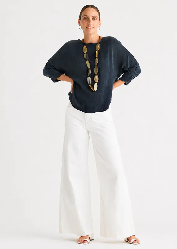Model wearing Dusk Evening Flow By LD + CO Available at Beetees Nelson
