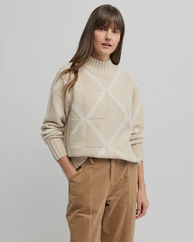 Model wearing Almond/Ecru Indiana Knit By Yarra Trail Available at Beetees Nelson