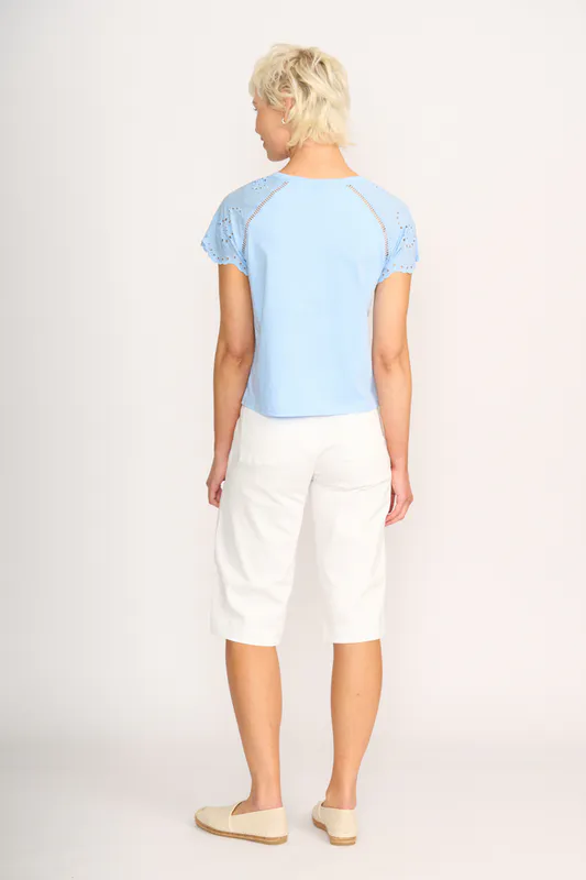 Model wearing Sky T-Shirt - Broderie Sleeve By Memo Available at Beetees Nelson