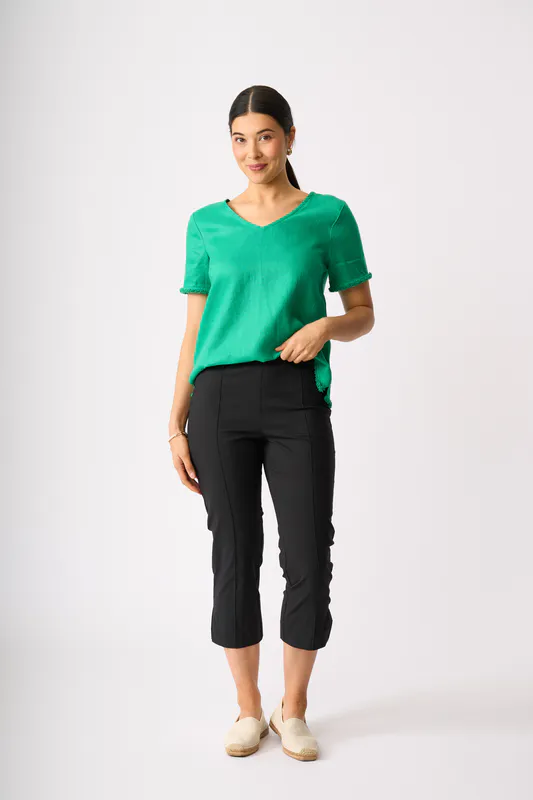 Model wearing Green Benefits Galore Top By Foil Available at Beetees Nelson