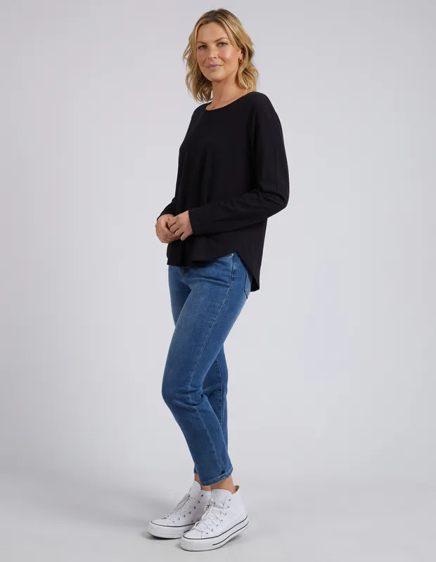 Model wearing Black Everyday Long Sleeve By Elm Available at Beetees Nelson