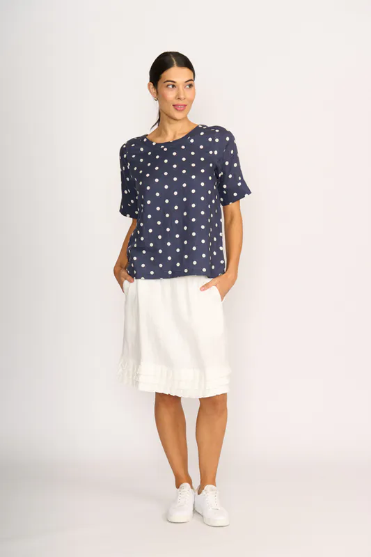 Model wearing Navy Spot Pleat Back Top By Foil Available at Beetees Nelson