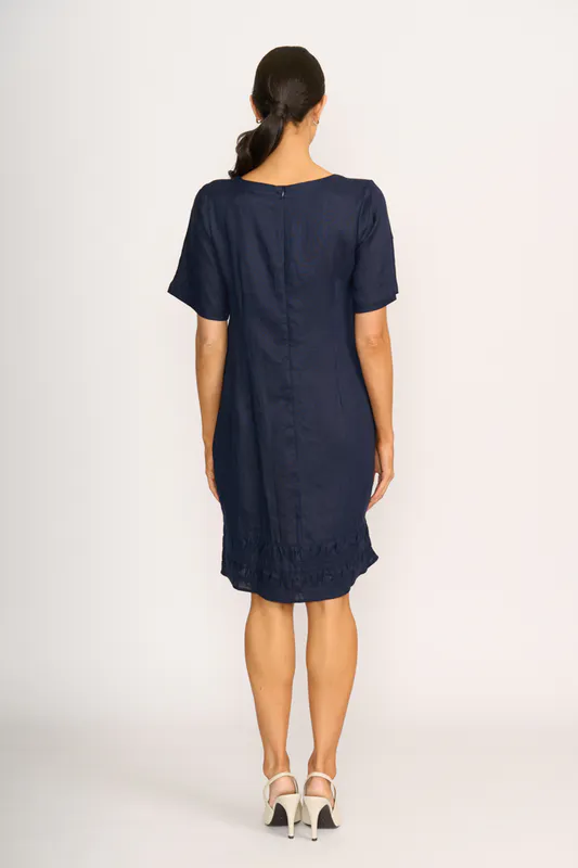 Model wearing Navy Crowd Pleaser Dress By Foil Available at Beetees Nelson