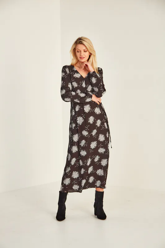 Model wearing Black Print Sandra Dress By Lemon Tree Design Available at Beetees Nelson