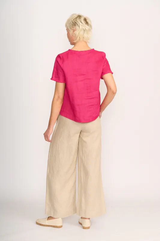 Model wearing Pink V Benefits Top By Foil Available at Beetees Nelson