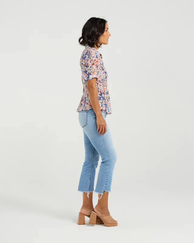 Model wearing Poppy Patch Ruby Blouse By Et Alia Available at Beetees Nelson