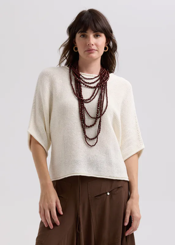 Model wearing white Textured Jumper By LD + CO Available at Beetees Nelson