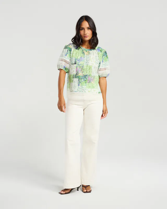 Model wearing Botanical Patch Paige Top By NMBR Rose Available at Beetees Nelson