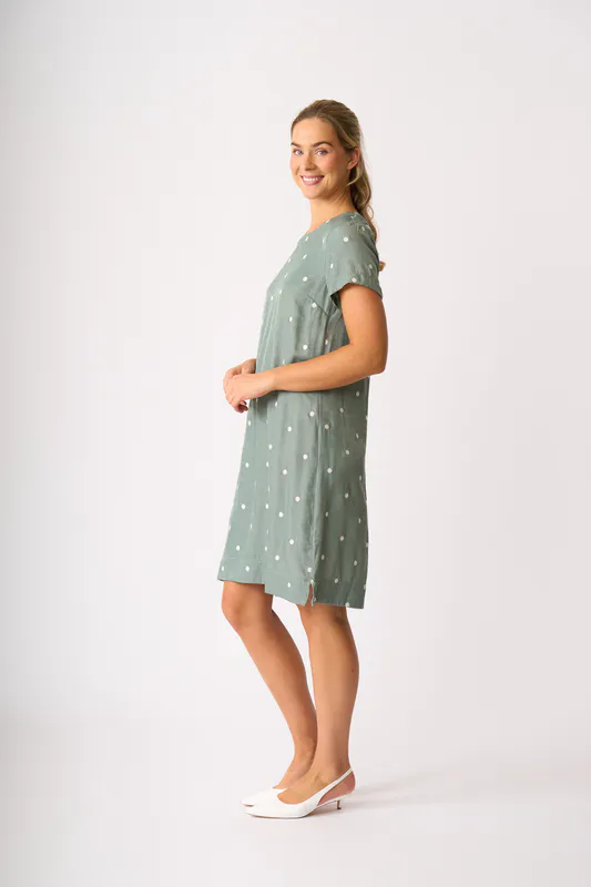 Model wearing Sage Spot On A Line Dress By Oh Three Available at Beetees Nelson