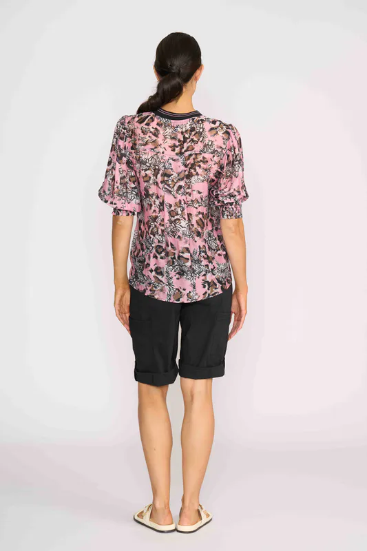 Model wearing Floral Leopard Rib Trim Blouse By Memo Available at Beetees Nelson