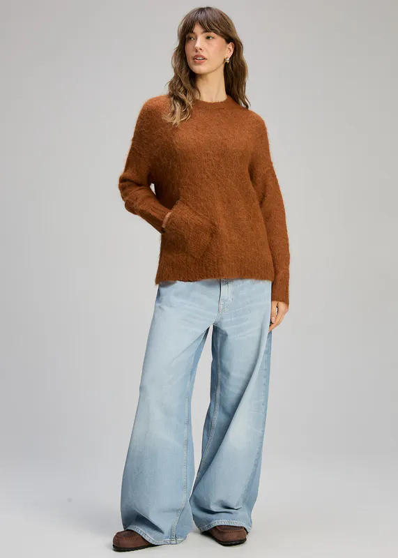 Model wearing Toffee Alpaca Jumper By Zaket & Plover Available at Beetees Nelson