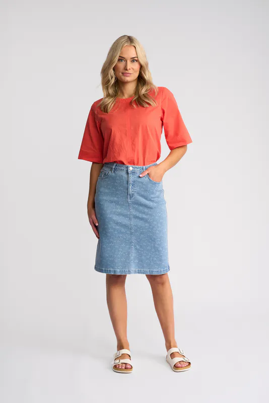 Model wearing Meadow Denim Poppy Skirt By Vassalli Available at Beetees Nelson