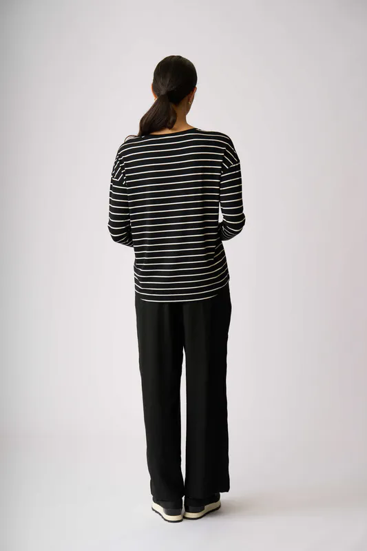 Model wearing Floral Bee Drop Shoulder Top By Foil Available at Beetees Nelson