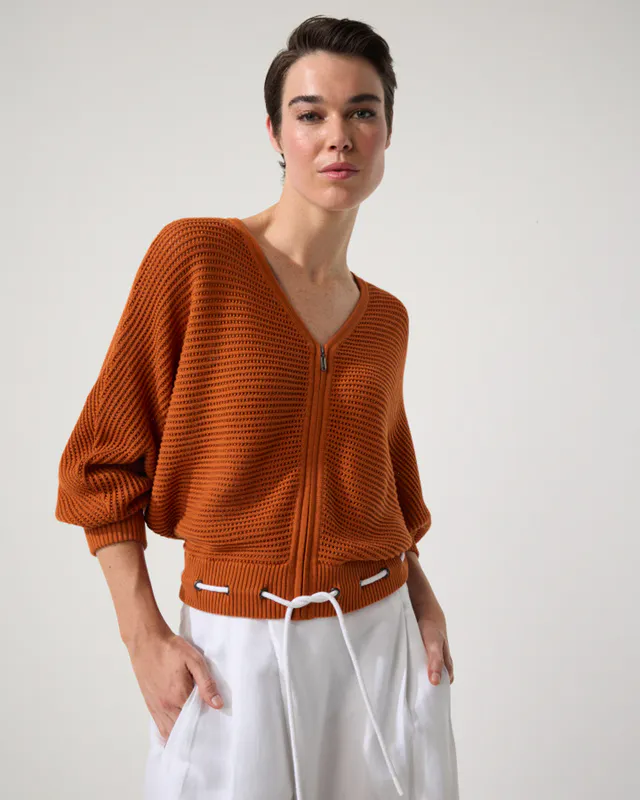 Model wearing Rust Open Knit Bomber By Marco Polo Available at Beetees Nelson