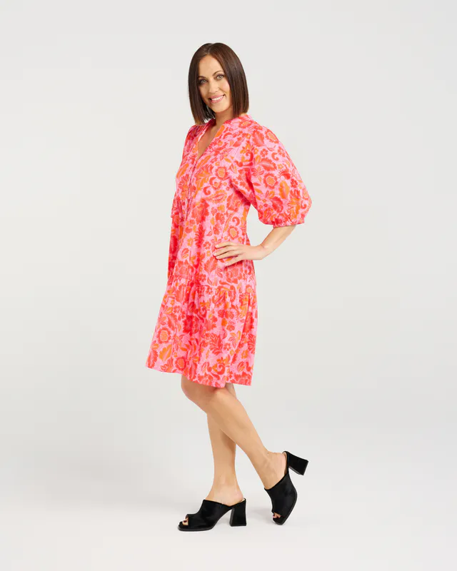 Model wearing Abstract Blush Eileen Dress By Seduce Available at Beetees Nelson