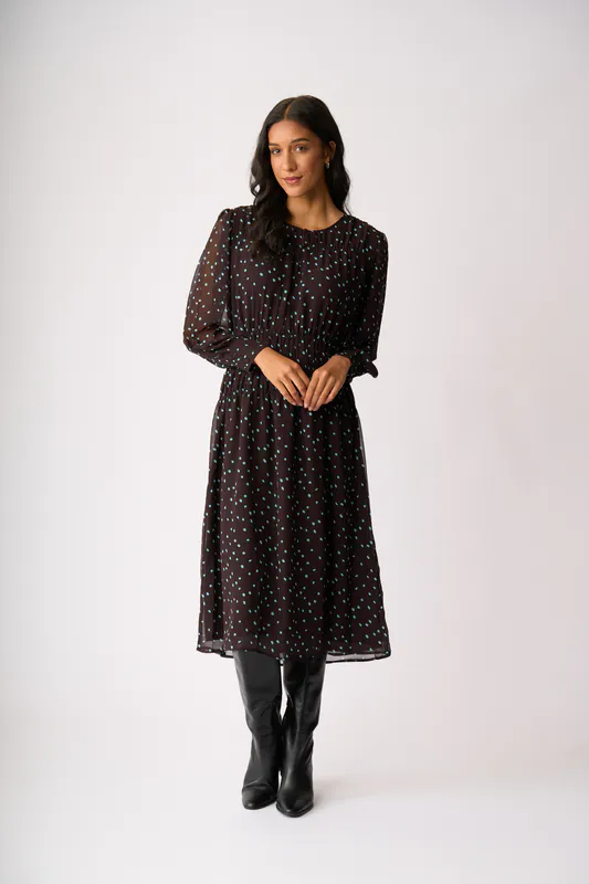 Model wearing Sky Coco Spot Shirr Around Dress By Memo Available at Beetees Nelson