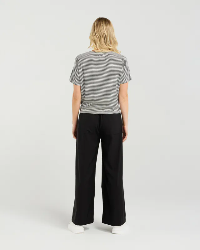 Model wearing Monochrome Stripe Twist Tee By Et Alia Available at Beetees Nelson