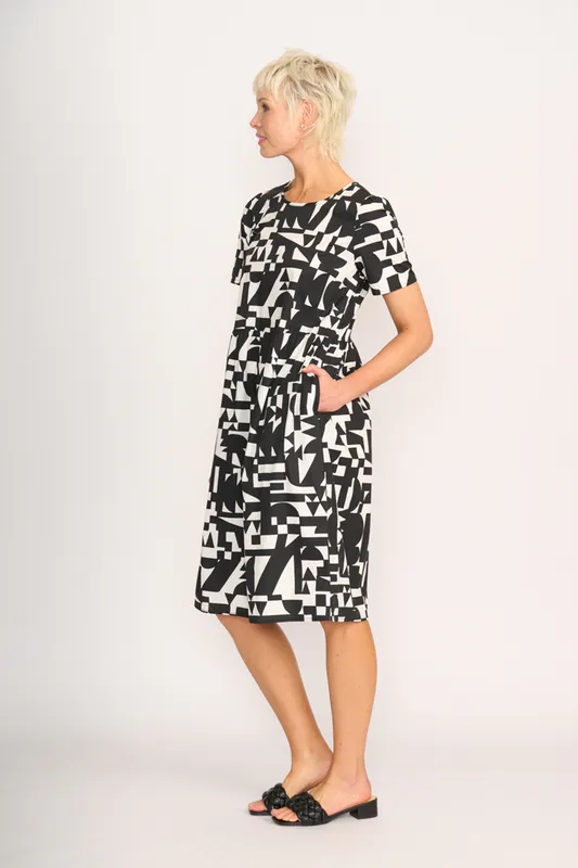 Model wearing Abstract Back Keyhole Dress By Foil Available at Beetees Nelson