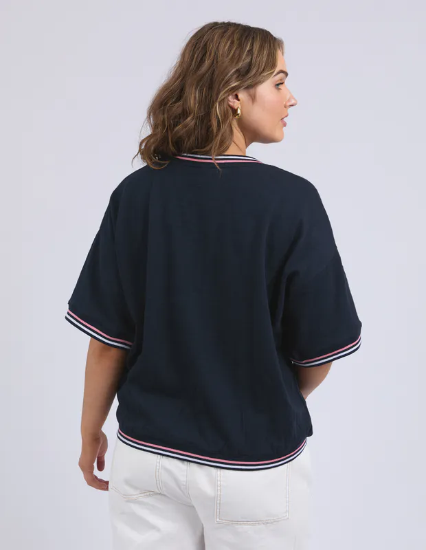 Model wearing Navy Faye Short Sleeve Sweat By Elm Available at Beetees Nelson