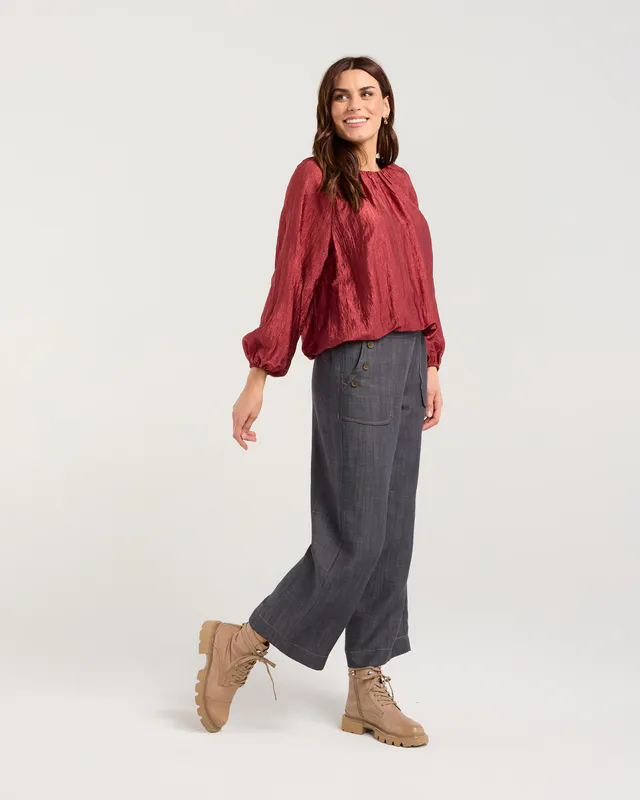 Model wearing Monet's Garden Addison Bubble Hem Top By Blackstone Available at Beetees Nelson