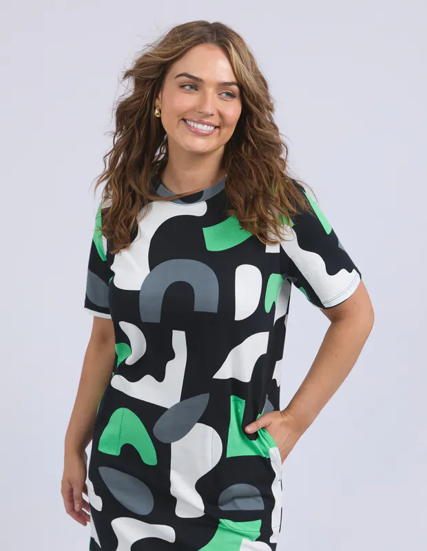 Model wearing Char Stijl Dress By Elm in Abstract Yardage Print Available at Beetees Nelson