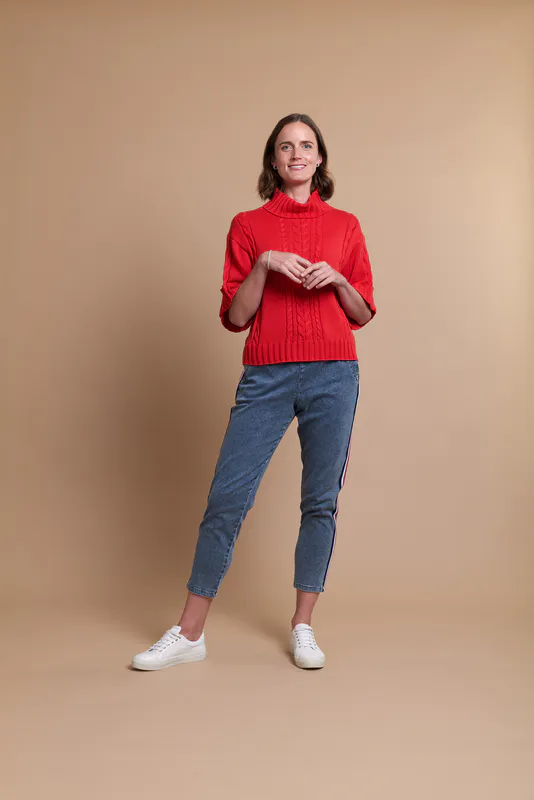 Model wearing Red Coloured Jumper - Cowl Neck, Cable Knit By Memo Available at Beetees Nelson