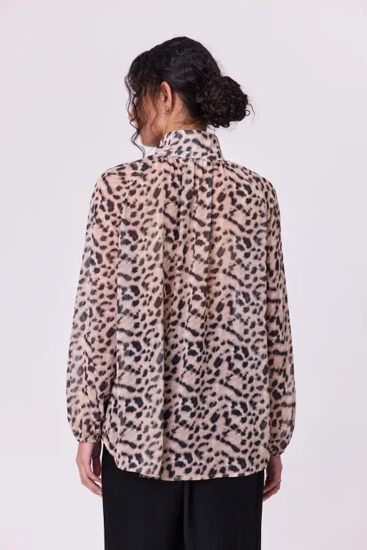 Model wearing Animal Print Bowie Blouse By Navy & Co. Available at Beetees Nelson
