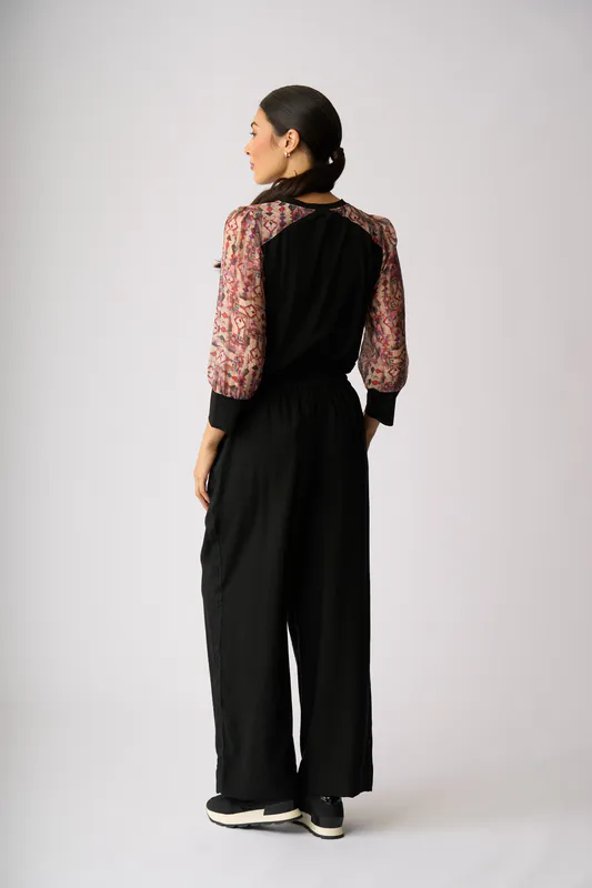 Model wearing Gems Contrast Woven Shoulder Top By Memo Available at Beetees Nelson