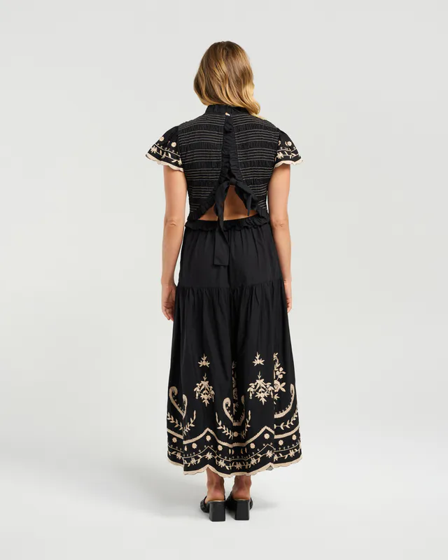 Model wearing Black Mia Dress By NMBR Rose Available at Beetees Nelson