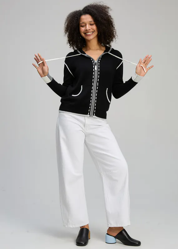 Model wearing Black Threaded Hoodie By Zaket & Plover Available at Beetees Nelson