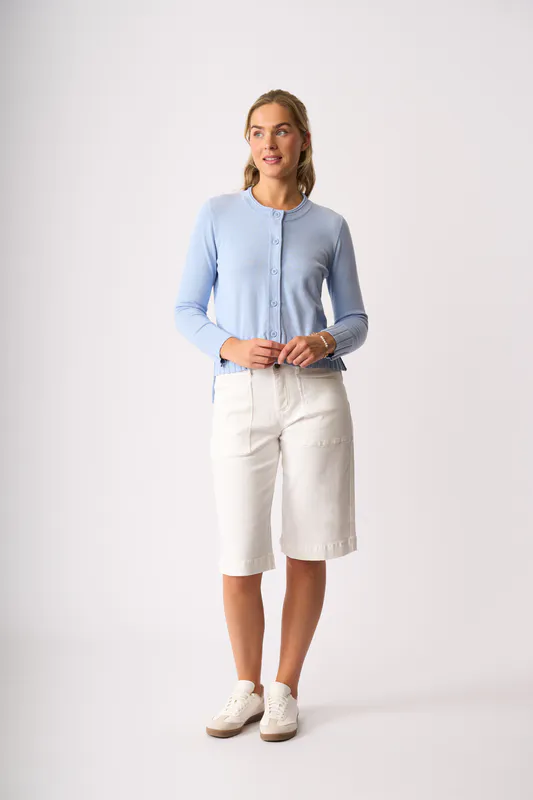 Model wearing Sky Blue Best Feature Cardigan By Foil Available at Beetees Nelson