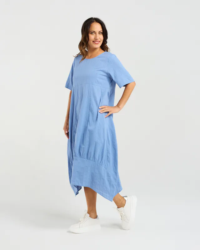 Model wearing Blue Selena Dress By Seduce Available at Beetees Nelson