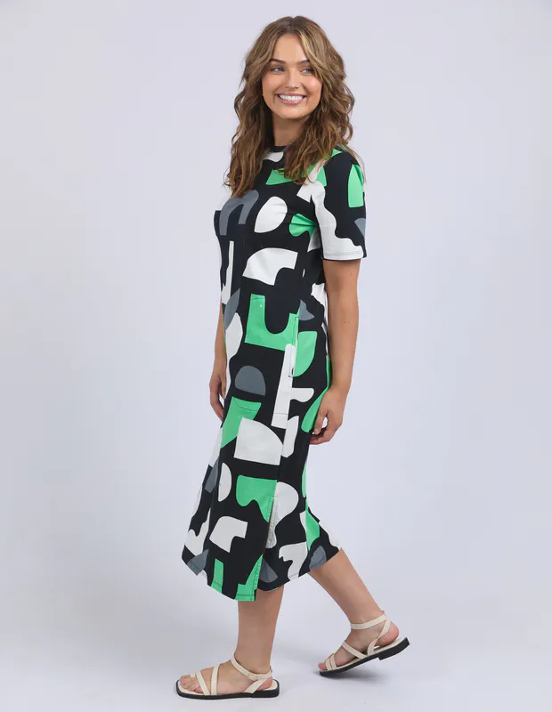 Model wearing Char Stijl Dress By Elm in Abstract Yardage Print Available at Beetees Nelson