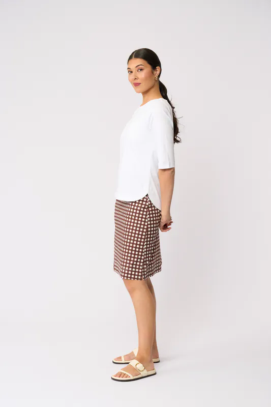 Model wearing Check IT Tee-Rific Skirt - Printed By Esplanade Available at Beetees Nelson