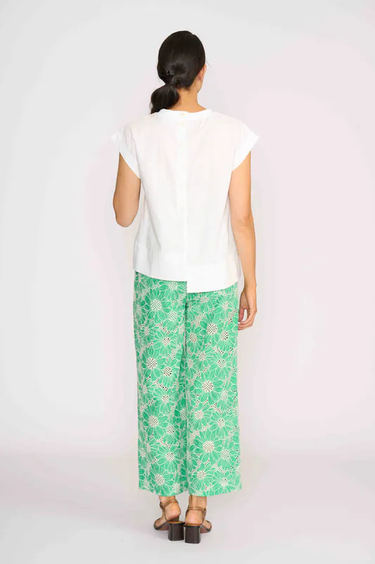 Model wearing White Cut Of Your Rib Top By Foil Available at Beetees Nelson