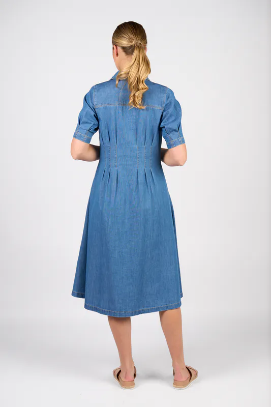 Model wearing Mid Wash Shaped Waist Button-Up Dress with Pockets By Vassalli Available at Beetees Nelson
