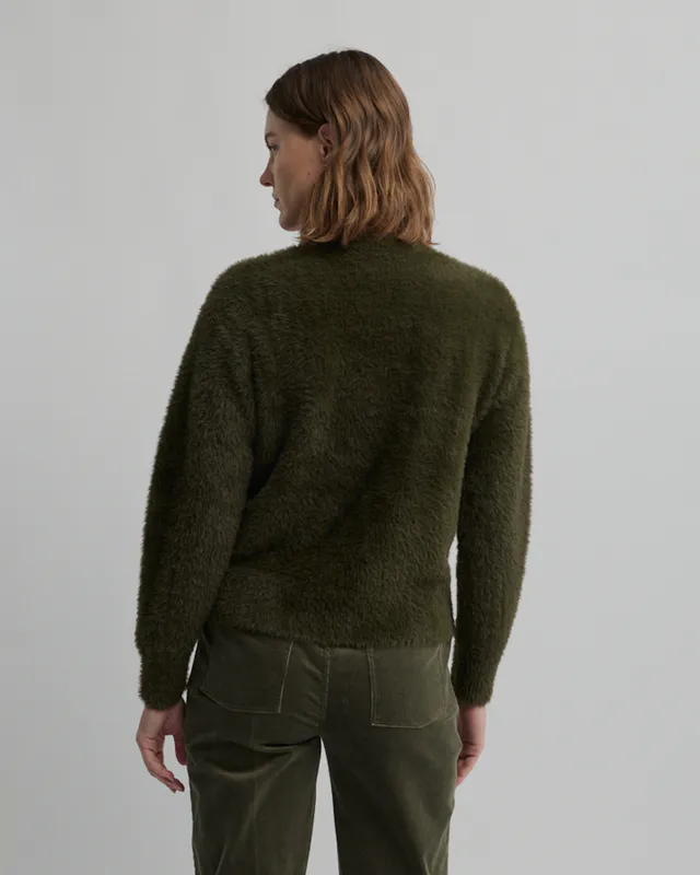 Model wearing Loden Hearth Knit By Yarra Trail Available at Beetees Nelson