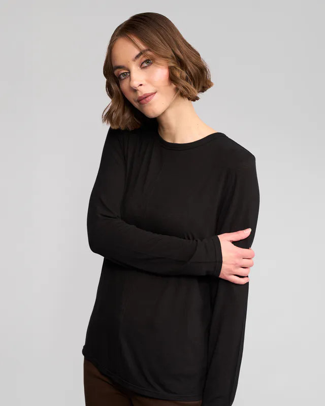 Model wearing Black Layer Top By Vassalli Available at Beetees Nelson