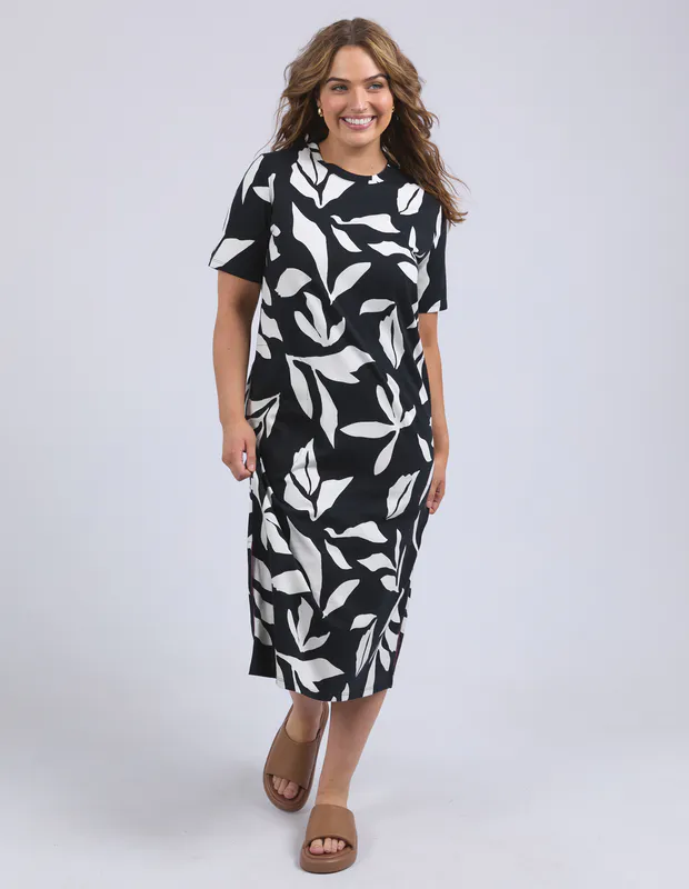 Model wearing Black Mimosa Tee Dress By Elm Available at Beetees Nelson