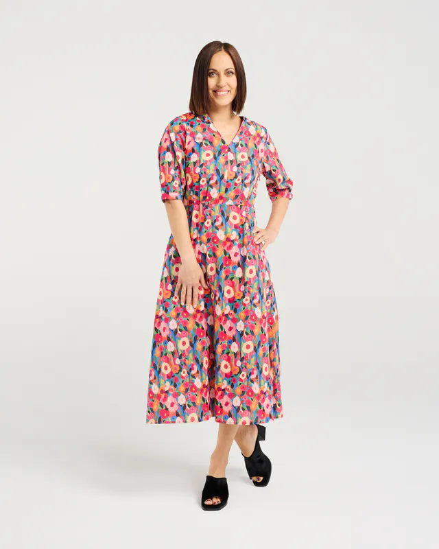 Model wearing Canvas Bloom Margot Dress By Seduce Available at Beetees Nelson