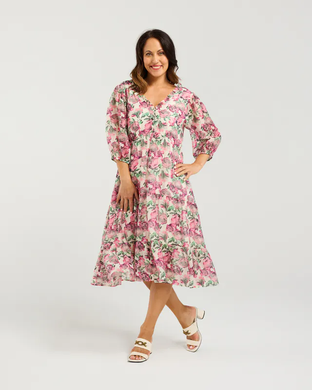 Model wearing Rose Garden June Dress By Seduce Available at Beetees Nelson