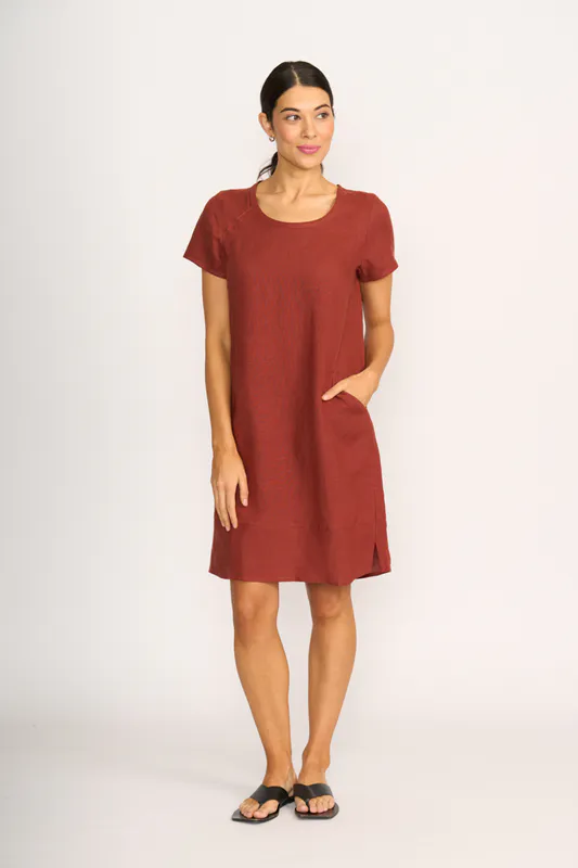 Model wearing Spice Dress - Panel Lines By Foil Available at Beetees Nelson
