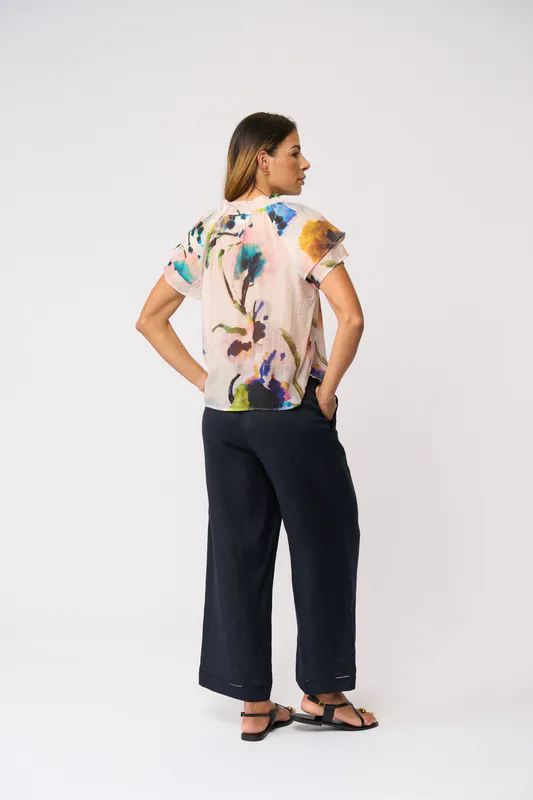 Model wearing True Navy Top Rank Trousers By Foil Available at Beetees Nelson