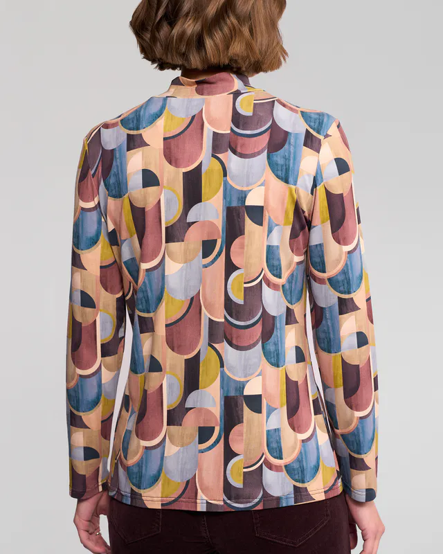 Model wearing Revolve Foundation Knit Top By Vassalli Available at Beetees Nelson