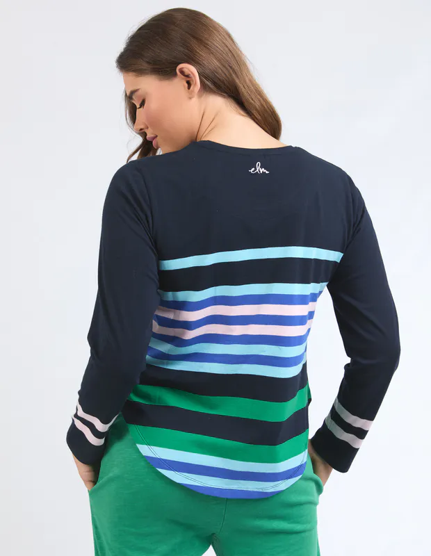 Model wearing Medley Stripe Long Sleeve Navy Available at Beetees Nelson