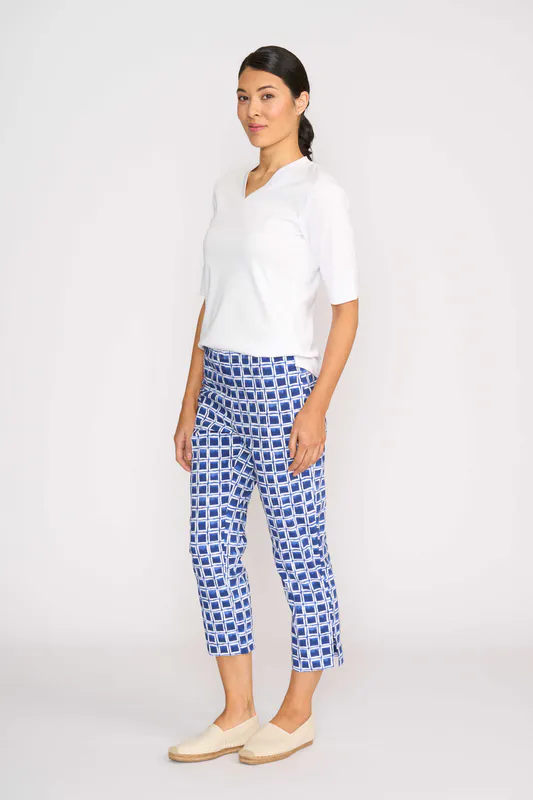 Model wearing White Slim V Neck Top By Esplanade Available at Beetees Nelson