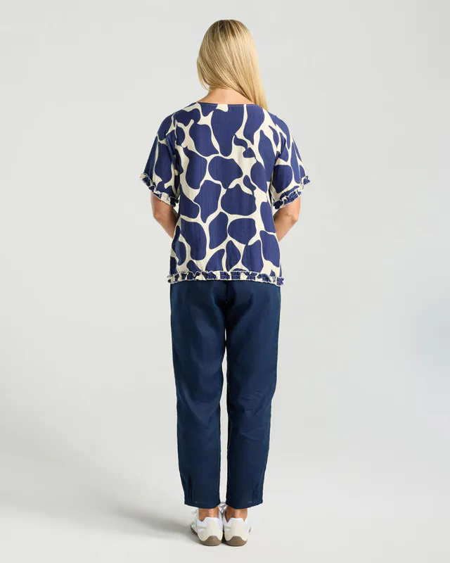 Model wearing Ink Cobblestones Lydia Frill Top By Blackstone Available at Beetees Nelson