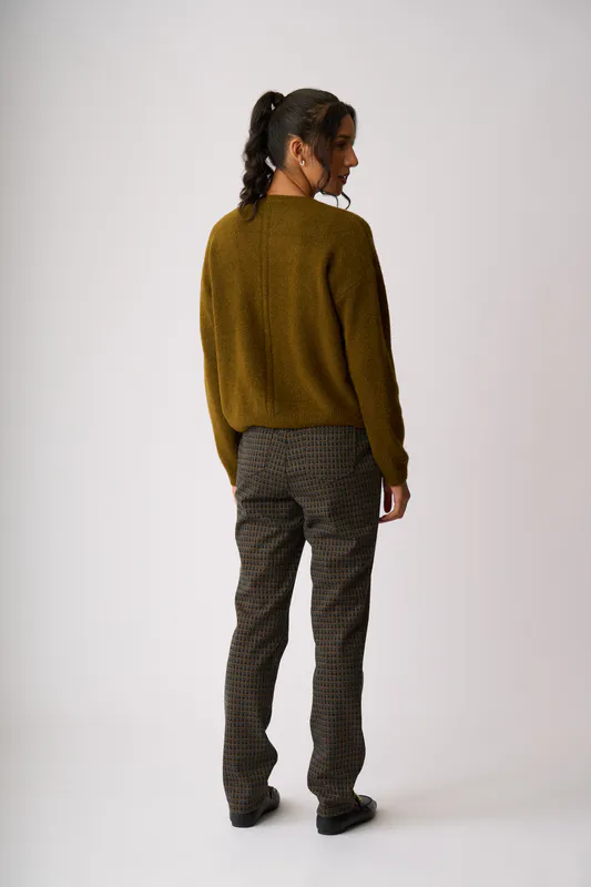 Model wearing Chartreuse Cropped Drop Hem Jumper By Memo Available at Beetees Nelson