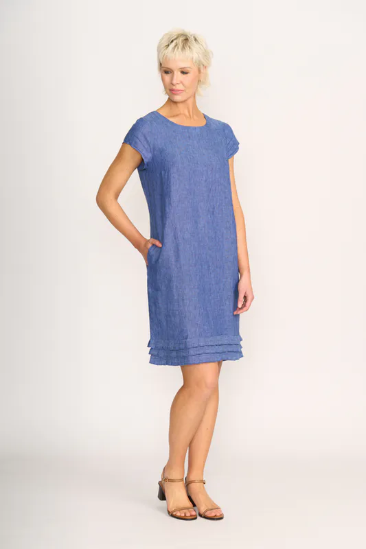 Model wearing Denim Dress - Pleat Dreams By Foil Available at Beetees Nelson